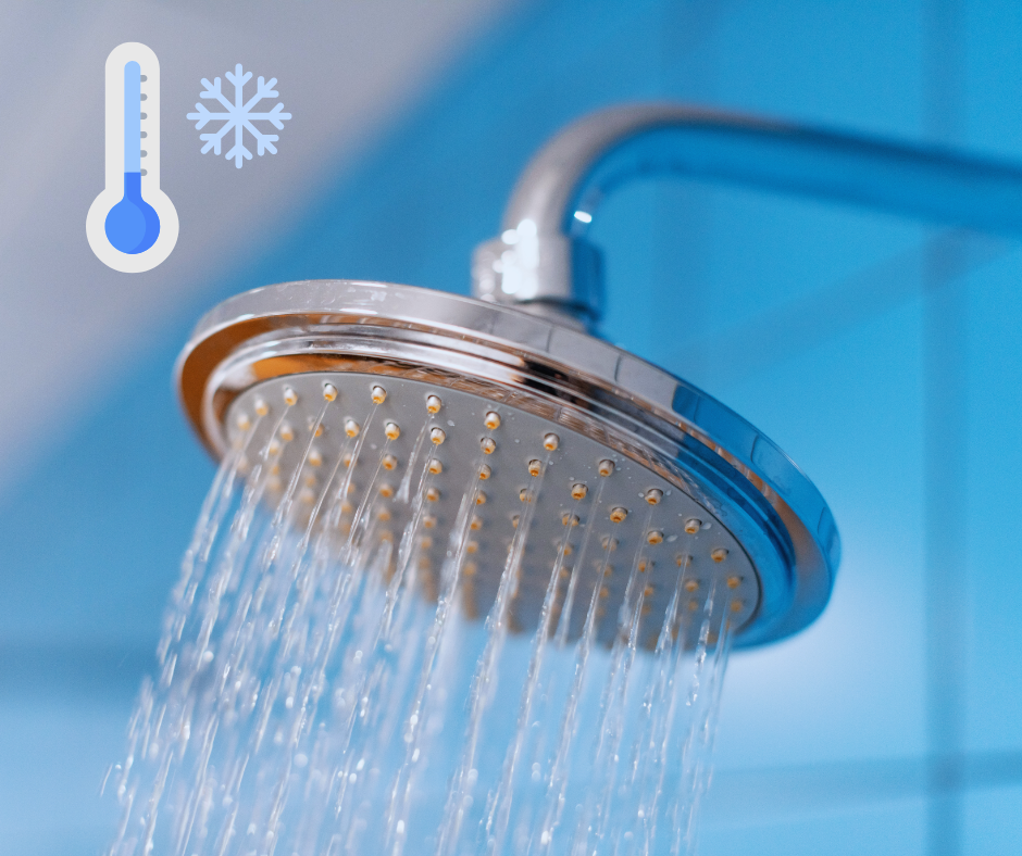 Photo of a shower head with a cold thermometer next to it.
