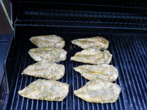 Lay your chicken on the grill smooth side down